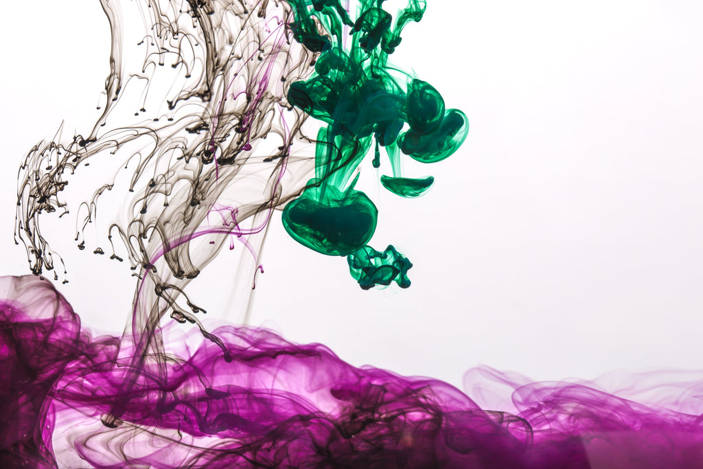purple-ink-with-green-and-black-drops